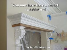 there is a mirror with some tape on it and the words you now have a corbel entablature