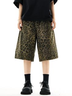 Unleash your wild side with these striking Leopard Print Wide-Leg Bermuda Shorts.
Crafted with a nod to vintage American leisurewear, these shorts boast a timeless leopard print on comfortable washed fabric. The wide-leg design ensures a versatile fit, making them an effortless addition to your relaxed yet stylish wardrobe.
Perfect for mixing and matching, pair these bermuda shorts with a sleek black top to let the print take center stage, or dress them down with a plain white tee for a casual d Leopard Print Wide Leg Bottoms With Relaxed Fit, Casual Leopard Print Cotton Bottoms, Trendy Relaxed Fit Leopard Print Bottoms, Wide Leg Cotton Bottoms In Leopard Print, Leopard Print Wide Leg Bottoms With Pockets, Wide Leg Leopard Print Bottoms With Pockets, Cotton Wide Leg Leopard Print Pants, Trendy Cotton Leopard Print Bottoms, Trendy Cotton Bottoms In Leopard Print