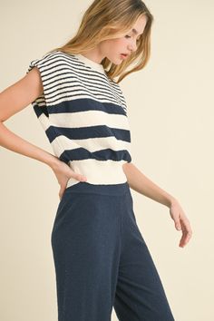 This sophisticated knit top boasts a classic striped pattern, perfect for elevating any outfit. Its elegant yet casual design makes it versatile for any occasion. Complete the look by pairing it with the matching pants, sold separately. Striped Sweater Outfit, Summer Knitwear, Designer Bra, Shop Pants, Knit Wear, Curvy Jeans, Mother Denim, Matching Pants, Casual Design