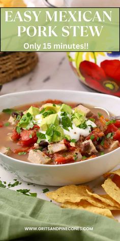 a bowl of mexican pork stew with tortilla chips and salsa on the side