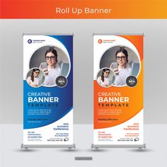 two roll up banners with an image of a woman in glasses on the front and back