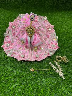 Very pretty pearl and resham work embellished laddu Gopal poshak  Available for  Size 0 - dress diameter is 4 inches  Size 1 - dress diameter is 5 inches  Size 2 - dress diameter is 6 inches  Size 4 - dress diameter is 8 inches  Size 5 - dress diameter is 10 inches  Size 6 - dress diameter is 12 inches  Quality guaranteed  From land of Krishna, Mathura Teej Festival, Laddu Gopal Dresses, Pearl Work, Anarkali Dress Pattern, Heavy Work, Peacock Design, Thread Embroidery, Work Dress, Pink Silk