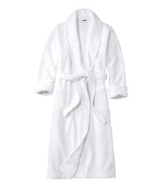 Perfect right out of the shower or any time, this spa-quality robe is incredibly plush on the outside with soft, absorbent terry texture on the inside. Relaxed Fit: Our most generous fit sits farthest from the body. Falls below calf - 48¾" from high point shoulder. In the most comfortable blend of 90% cotton and 10% polyester. Machine wash and dry. Locker loop for easy hanging. Shawl collar. Front patch pockets. Removable tie belt at waist. Imported. | Women's Soft Plush Terry Robe, Cotton Blend Terry Cloth Robe, Terry Robe, Women's Sleepwear, Women's Robe, Womens Robes, Christmas 2020, Sleepwear Robe, High Point, Sleepwear Women