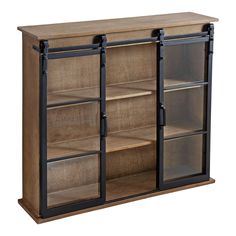 a wooden cabinet with glass doors and shelves on one side, black metal handles to the other