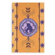 an orange and purple wall hanging with a silhouette of a woman on it's face