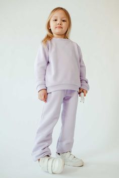 Sofa Killer trendy, playful, basic unisex kids pants MEDUSA in light purple colour. Is your mini-me already the best dressed kid around? Well, make sure you add an extra layer of adorable with this super comfy SofaKiller cotton trousers! Possible matching two-piece set with matching pullover. Oh, and we're not saying you should get all your family matching clothing...but we're totally suggesting it. After all, they are so soft it's impossible to get out of them, and any family night is made even Lavender Cotton Pants For Loungewear, Lavender Cotton Loungewear Pants, Lavender Cotton Lounge Pants, Casual Purple Bottoms For Playwear, Casual Purple Playwear Bottoms, Well Dressed Kids, Hell Lila, Matching Clothing, Cosy Outfit