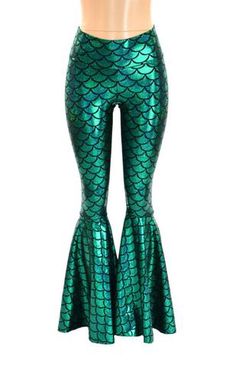 the green mermaid tail leggings are made from shiny material and have fish scales on them