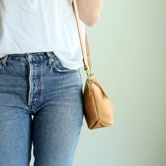 Beige undyed vegetable tanned leather purse, handmade with a zipper closure and removable leather strap, by Juliette Rose Designs Classic Crossbody Phone Bag For On-the-go, Versatile Shoulder Phone Bag For On-the-go, Versatile Crossbody Bucket Bag For On-the-go, Chic Everyday Bucket Bag With Cell Phone Pocket, Top Handle Bag With Cell Phone Pocket, Versatile Everyday Shoulder Bag With Cell Phone Pocket, Versatile Shoulder Bag With Cell Phone Pocket, Chic Satchel With Cell Phone Pocket For Everyday Use, On-the-go Shoulder Bag With Cell Phone Pocket