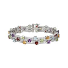 A color explosion, this radiant bracelet complements any attire. Sterling silver White lab-created sapphires gleam along the three-row design Round-cut citrine, garnet, amethyst, peridot and sky blue topaz stones are staggered for pops of color 7.25 inches with box clasp Look for the matching multi-row ring Multicolor Gemstone Sterling Silver Bracelet, Elegant Multicolor Gemstone Sterling Silver Bracelet, Multicolor Multi-stone Round Diamond Bracelet, Multicolor Multi-stone Diamond Bracelet, Elegant Multicolor Multi-stone Sterling Silver Bracelet, Fusion Style Multicolor Multi-stone Bracelets, Multicolor Formal Fusion Bracelets, Fine Jewelry Multicolor Gemstone Diamond Bracelet, Multicolor Gemstone Diamond Bracelet