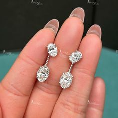 Center Stone Details : → Stone Shape: Oval Cut Moissanite → Weight : 5.00 Ctw (One Piece 2.50 Ctw) → All Stone : Moissanite → Color: White → Clarity: VVS1 → Luster: Excellent → Make: High Quality Custom make your jewelry with DutchMarquiseStudio * DutchMarquiseStudio accepts customized and personalized orders. * We make jewelry in Silver, 10k, 14k, 18k white/yellow/rose gold. * We do make jewelry using moissanite, diamonds, or birthstones/gemstones * Process of customization is fun and simple wi Oval Diamond Earrings With Vvs Clarity For Wedding, Oval Vvs Clarity Diamond Earrings For Wedding, Gia Certified Oval Wedding Earrings, Gia Certified Oval Diamond Earrings For Anniversary, Oval Brilliant Cut Diamond Earrings For Wedding, Oval Diamond White Diamond Earrings For Wedding, Oval Diamond White Wedding Earrings, Oval Diamond White Earrings For Wedding, Oval Diamond Earrings With Vvs Clarity