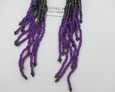 "Amazing Windsock Design Native American Style Seed Bead Earrings Ethnic Earrings BOHO Handmade Free Shipping . Stainless steel ear wires and nearly 6\" off the ear. Beautiful combination of exciting new colors for matching regalia or wearing alone. As always... Ships Free from Hawaii with Aloha!" Purple Beaded Earrings With Round Beads For Festival, Adjustable Purple Beaded Earrings With Colorful Beads, Festival Purple Beaded Earrings With Round Beads, Traditional Purple Beaded Earrings For Festivals, Bohemian Purple Beaded Earrings For Beach, Traditional Purple Beaded Earrings, Festival Purple Beaded Earrings, Purple Colorful Beaded Earrings For Festival, Purple Beaded Earrings Native Americans