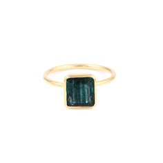 Azure Square Tourmaline Signet Ring featuring a blue green square shaped tourmaline set in a stylish modern signet ring. - Natural tourmaline approx. 3.60 karats.- 22 karat ion plated gold over sterling silver.- Gemstone dimensions approx. 10mm square.- Size 7, resizable. Modern Gold Tourmaline Jewelry, Modern Jewelry With Rectangular May Birthstone, Modern Rectangular May Birthstone Jewelry, Modern Yellow Gold Tourmaline Jewelry, Modern Gold Tourmaline Rings, Modern 14k Gold Emerald Ring, Modern Emerald Ring As A Gift, Modern Emerald Ring As Gift, Modern Tourmaline Emerald Cut Rings