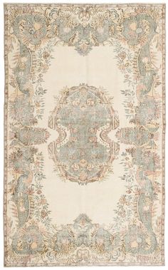 an antique rug with many different colors and designs on the carpet is shown in this image