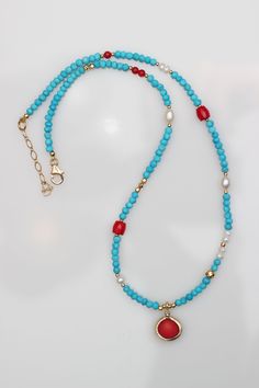 Free upgraded shipping Attractive Turquoise, coral and pearl necklace. Very rich, 18K Gold plated over sterling silver A beautiful handmade natural stone The pieces of jewelry are produced of carefully selected material and stones. The coating is carried out with high-level precision. Every item of jewelry passes manual handling processes ensuring utmost attention to top quality finish. You are welcome to contact me with any questions. ♥ Total length 45 cm. Comes packaged in a cute gift box Pack Manual Handling, Gemstone Choker, High Jewellery, Cute Gift Boxes, Hanukkah Gifts, Coral Turquoise, Jewellery Design, Cute Gift, High Jewelry