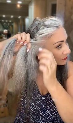 This guide shares a fabulous hairstyle for gray hair. Learn a rope braid bun hairdo in this quick post. Bun Hairdo, Messy Braided Hairstyles, Rope Braided Hairstyle, Grey Hair Over 50, Braid Bun, Twisted Hair, Hair Twist, Easy Hair Updos, Rope Braid