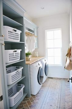 a washer and dryer in a small room