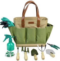 a green bag with gardening tools in it