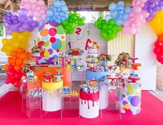 a birthday party with balloons and decorations