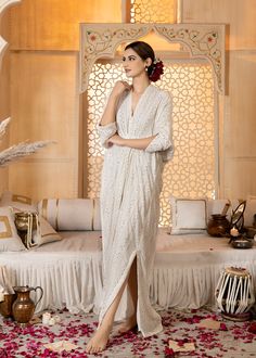 White mirrorwork Kaftan, handworked and embellished with resham and mirrorwork details (fully worked front and back) Bollywood Style Embroidered Dress With Mirror Work, Hand Embellished Embroidered Dress For Eid Festival, Bollywood Style Festive Embroidered Dress With Mirror Work, Hand Embellished Straight Kurta For Festivals, Traditional Embroidered Dress With Mirror Work For Designer Wear, Traditional Embellished Embroidered Dress For Reception, Eid Party Embroidered Dress With Mirror Work, Traditional Hand-embellished Wedding Dress, Bollywood Style Hand Embellished Chanderi Kurta