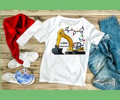 Perfect Tshirt for the cool kid in your life! The perfect winter shirt! Every item is handmade, slight variations may occur.  For different style shirts send seller a message! Custom orders always welcome. Construction Shirt, Construction Birthday Shirt, Kids Christmas Shirt, Kids Construction, Griswold Family Christmas, Boys Tshirt, Holiday Graphic Tees, Construction For Kids, Christmas Shirts For Kids