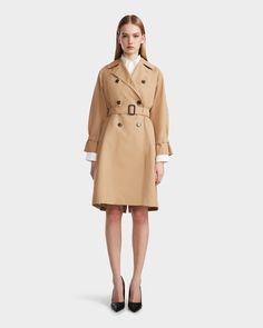 Redefine timeless elegance in the MIRELLE by RUDSAK, a women's classic trench that features flattering tailored silhouette, accentuated by a button-up front and a removable belt for versatile styling. Its distinctive inner lining features RUDSAK branding and striped sleeve lining, ensuring you make a statement both inside and out. MIRELLE is not just a trench; it's a style essential that seamlessly combines sophistication with versatility, perfect for any occasion where classic meets contemporary. Elegant Outerwear With Belted Cuffs, Timeless Gabardine Outerwear For Spring, Classic Outerwear With Notch Lapel And Belted Cuffs, Timeless Formal Outerwear With Belted Cuffs, Timeless Outerwear With Belted Cuffs, Timeless Outerwear With Belted Cuffs For Work, Classic Business Outerwear With Belted Cuffs, Timeless Spring Outerwear With Button Closure, Business Outerwear With Belted Cuffs In Gabardine