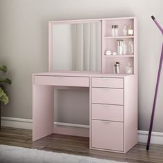 a pink desk with a mirror and drawers