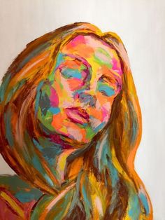 a painting of a woman's face with long hair and bright colors on it