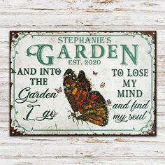 a sign that says stephanie's garden and into the garden i go to lose my mind and find my soul