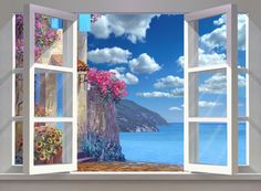 an open window with flowers on the windowsill looking out at water and clouds in the sky