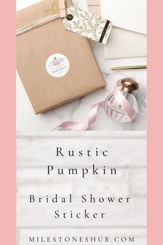 the rustic pumpkin bridal shower sticker is next to a notepad and pen