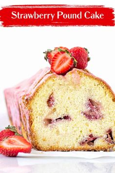 a close up of a cake with strawberries on it and one slice cut off