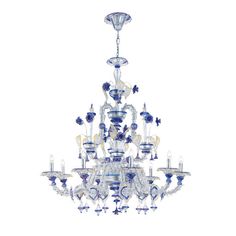 a blue and white chandelier with many lights on the bottom half of it