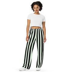 Fun black and white stripes make these the coolest casual lounge pants. Pajamas for bedtime or just comfy wide-leg pants for kicking back around the house. Versatile black stripes make these great pants for your pirate costume. PJLove pants feature a relaxed unisex fit and can be worn comfortably on the waist or the hips. Elastic waistband with white drawstring for ultimate sizing versatility. With practical side pockets, our pjs/lounge pants are made of premium knit mid-weight (6.19 oz/yd2) jer Striped Sporty Sweatpants For Loungewear, Sporty Striped Sweatpants For Loungewear, Sporty Striped Pants For Loungewear, Casual Striped Cotton Sweatpants, Trendy Striped Pants For Loungewear, Striped Relaxed Fit Bottoms For Lounging, Wide Leg Bottoms With Contrast Stripes For Loungewear, Wide Leg Loungewear Bottoms With Contrast Stripes, Casual Relaxed Fit Wide Leg Pants With Vertical Stripes