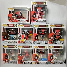 some deadpool toys are on display for sale