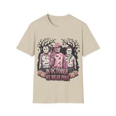 Step up your spooky season style with this fun and fierce "In October We Wear Pink" t-shirt, featuring none other than Freddy Krueger, Michael Myers, and Jason Voorhees decked out in pink! This tee is perfect for Halloween lovers who want to mix spooky with a statement. Whether you're showing support for breast cancer awareness or simply rocking a standout look for Pink Halloween, this shirt is both stylish and meaningful. It's great for those who love to celebrate the season with a unique twist and appreciate iconic horror characters embracing a softer side.   Perfect for gifting too! Whether it's for a breast cancer survivor, someone who loves a good spooky season outfit, or a fan of horror classics with a modern twist, this tee makes an unforgettable present. Wear it to your next Hallow Horror Classics, In October We Wear Pink, Halloween Lovers, Jason Voorhees, Pink Halloween, Horror Characters, Freddy Krueger, Michael Myers, Pink Tshirt