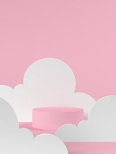 pink and white clouds against a light pink background with a circular object in the middle