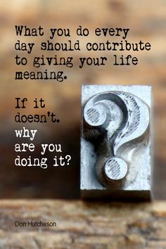 a metal block with a question mark on it and the words, what you do every day should continue to giving your life meaning