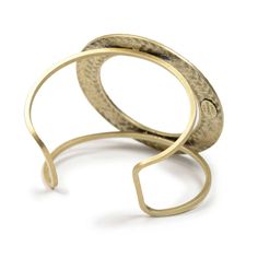 "This bracelet is a modern interpretation of a mid-century 1960s favorite. So true to the era and so relevant to current fashion, it has presence and clean simplicity. A bronze braided circle spans this open cuff, its graceful lines conforming to your wrist. Open cuff is sturdy and is adjustable to your wrist size. Fits sizes 6\" to 8\" wrists. Circle is 2-5/8\" diameter. Signed Sweet Romance Jewelry. Cast and fabricated by hand in our Los Angeles, USA studio." Adjustable Brass Bracelets For Formal Occasions, Adjustable Brass Bangle For Formal Occasions, Adjustable Retro Nickel-free Jewelry, Formal Adjustable Brass Bangle, Adjustable Metal Bangle In Minimalist Style, Modern Adjustable Cuff Bracelets, Adjustable Modern Cuff Bracelets, Modern Brass Cuff Bangle, Vintage Adjustable Brass Bangle