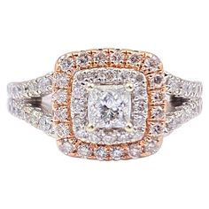 two tone gold and white diamond ring with square shaped center surrounded by smaller round diamonds