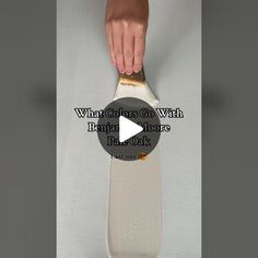 someone using a brush to paint a snowboard with text overlay that reads, what colors go with banyan moore trak?