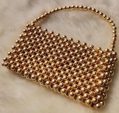 I carefully prepared this specially designed gold beaded bag. Due to its size, the bag is designed to carry your credit cards, car keys, coins and paper money on days when you want to look stylish. Size of the bag: 18cm x 10cm Bead Purse, Bead Bag, Beaded Bag, Beaded Purses, Women Handbag, Beaded Bags, Bag Vintage, Boho Women, Paper Money