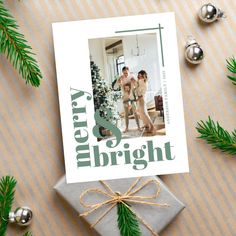 a christmas card with the words merry and bright printed on it next to presents wrapped in twine