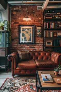 a brown leather couch sitting in front of a book shelf