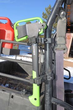 the back end of a truck with two different types of items on it's rack