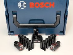 bosch tools are sitting in front of a blue toolbox with six holes on it