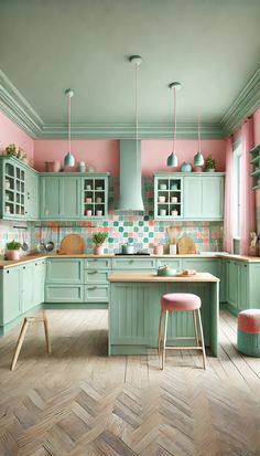 a kitchen with pink and green walls, wooden flooring and an island in the middle