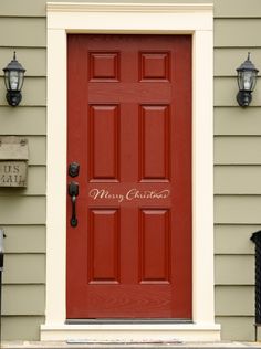 a red door with welcome written on it