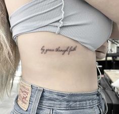 a woman with a small tattoo on her stomach that says, you are always full