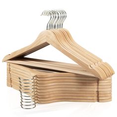 PRICES MAY VARY. Safe & Smellless Coating Wooden Hangers: Covered with eco-friendly paint without any unpleasant odor. These wood coat hangers are safe for our family and pets. Not Easy Broken Off: Made of solid wood, can hold up to 11 lbs. These wood hangers are strong enough to hold your winter coats. They are not flimsy when hanging your heavy duty clothes. Hand Polished Smooth Surface & Ergonomic Shoulder Design: With double hand-sanding craft without burr, the surface of wooden clothes hang Wood Coat Hanger, Heavy Clothing, Wooden Coat Hangers, Suit Hangers, Suit Jacket Dress, Eco Friendly Paint, Coat Hangers, Plastic Hangers, Wood Hangers