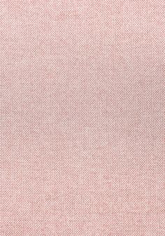 a close up view of a pink fabric textured with small white dots and lines